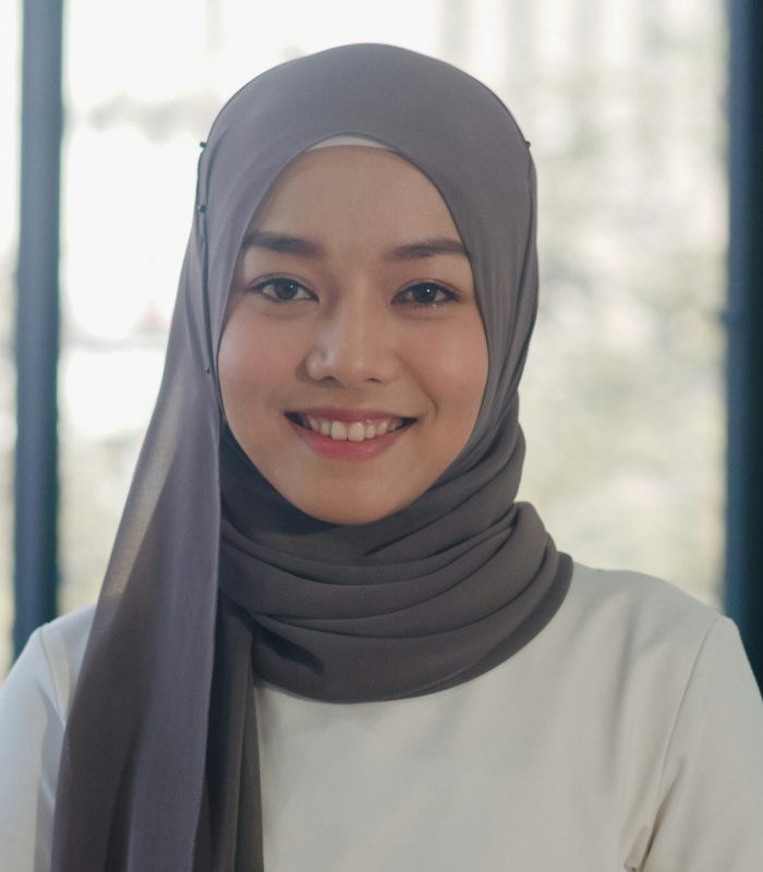 Portrait of successful beautiful executive businesswoman looking at camera and smile in office.